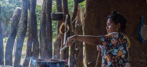 Woman cooking in La Guajira, Colombia 